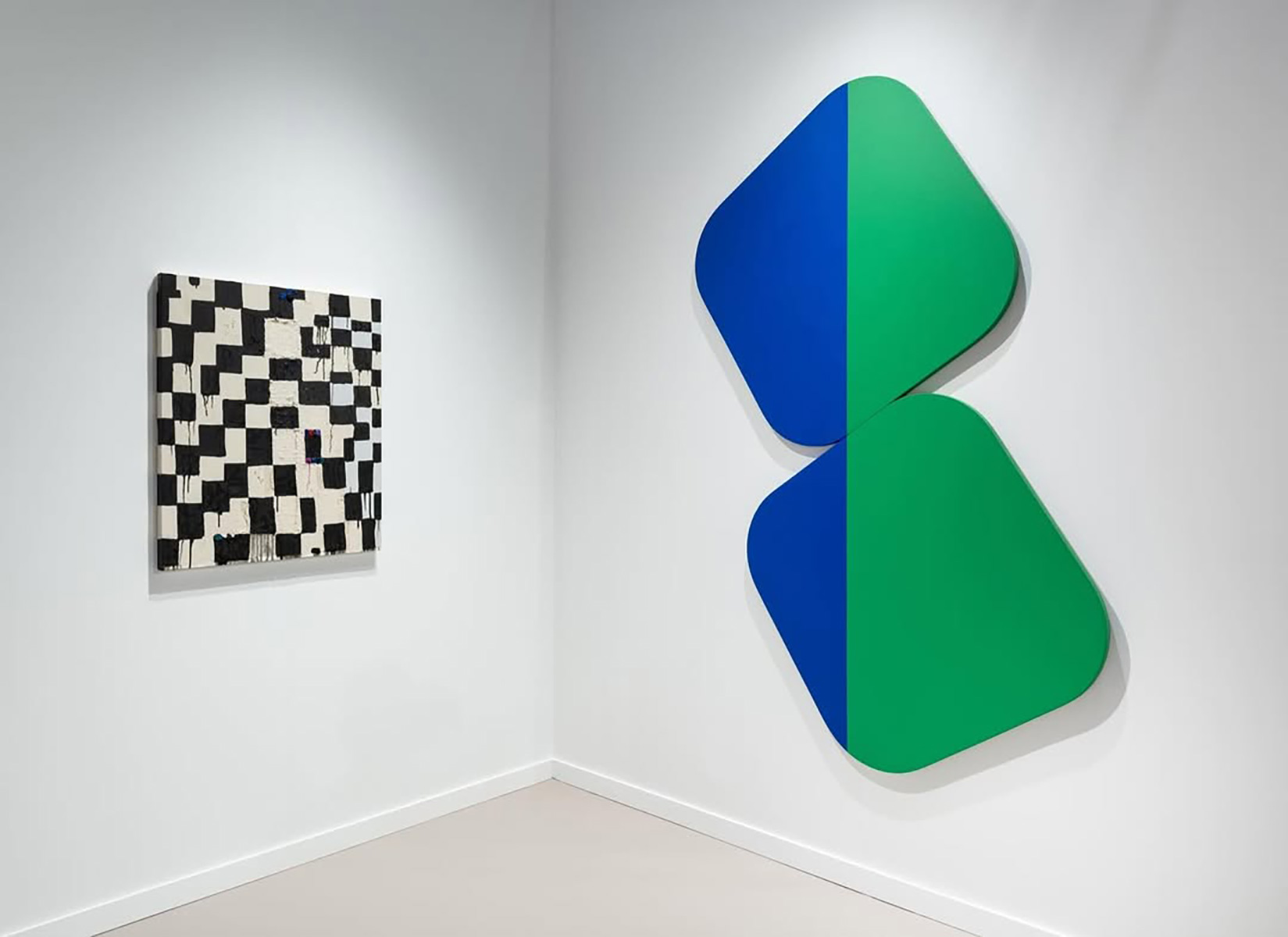 At left, Judy Ledgerwood, “Absalon,” 2022; at right, Leon Polk Smith, “Constellation No. 4 Vertical Blue-Green,” 1971 | Source: Richard Gray Gallery