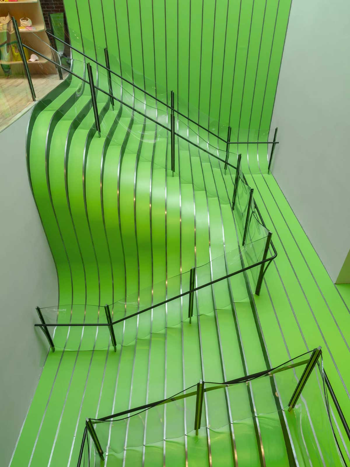 Longchamp’s SoHo Flagship Reborn in Neon and Steel