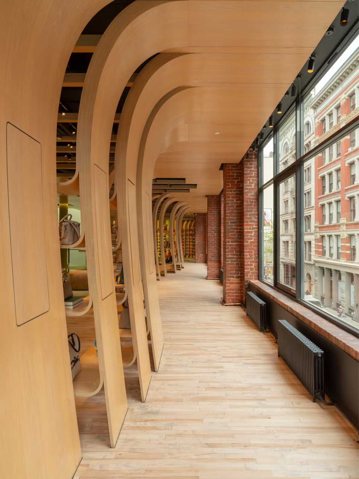 Longchamp’s SoHo Flagship Reborn in Neon and Steel