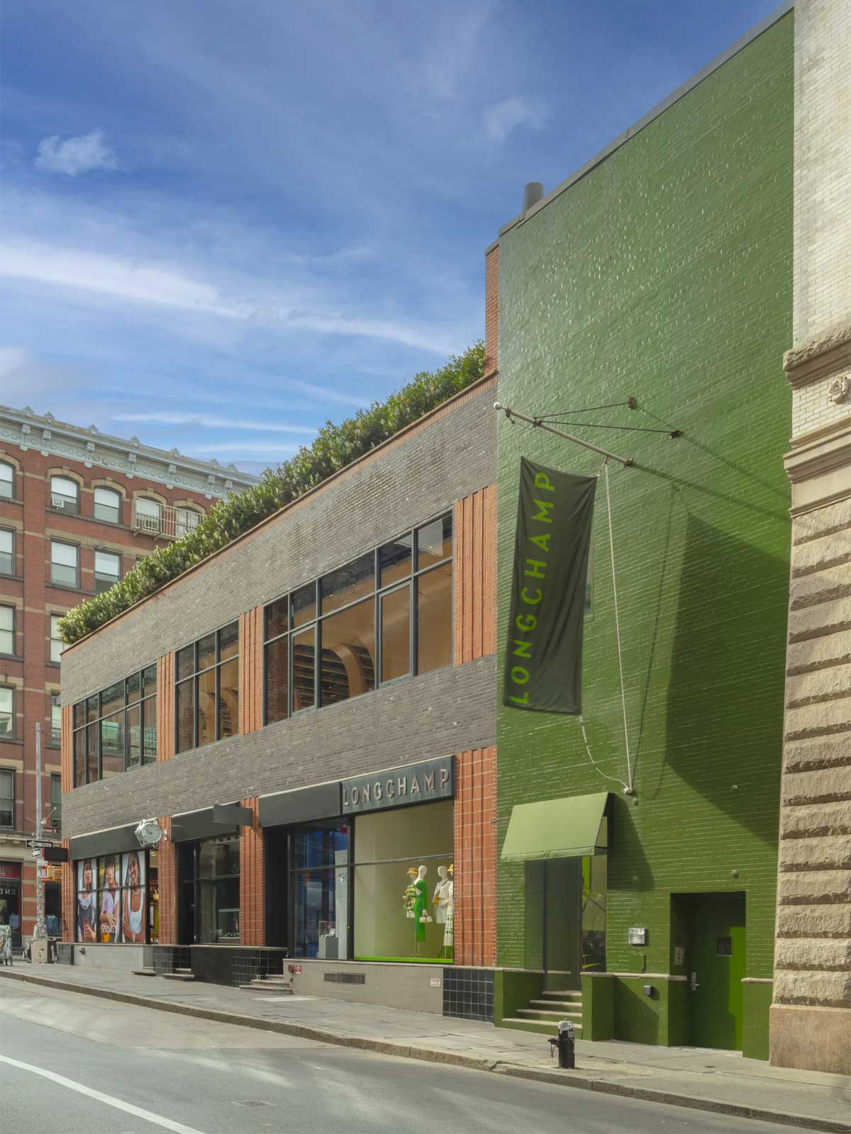 Longchamp’s SoHo Flagship Reborn in Neon and Steel