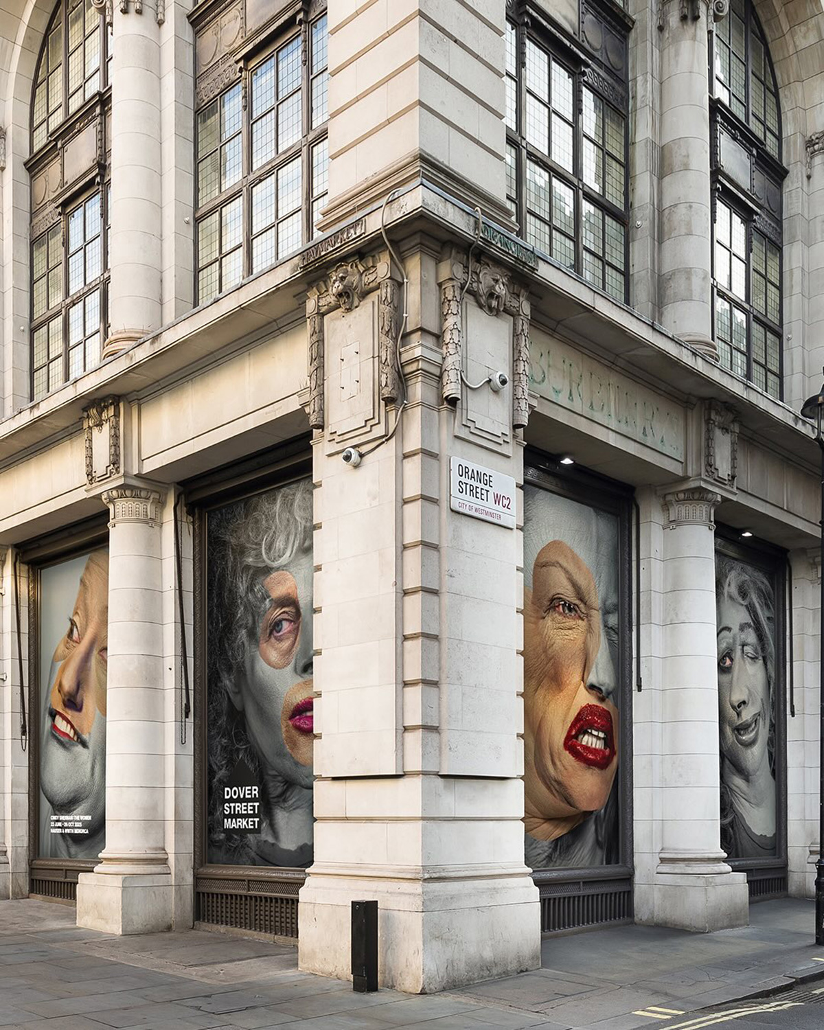 Window installation designed by Rei Kawakubo featuring Cindy Sherman's work | Source: COMME des GARÇONS